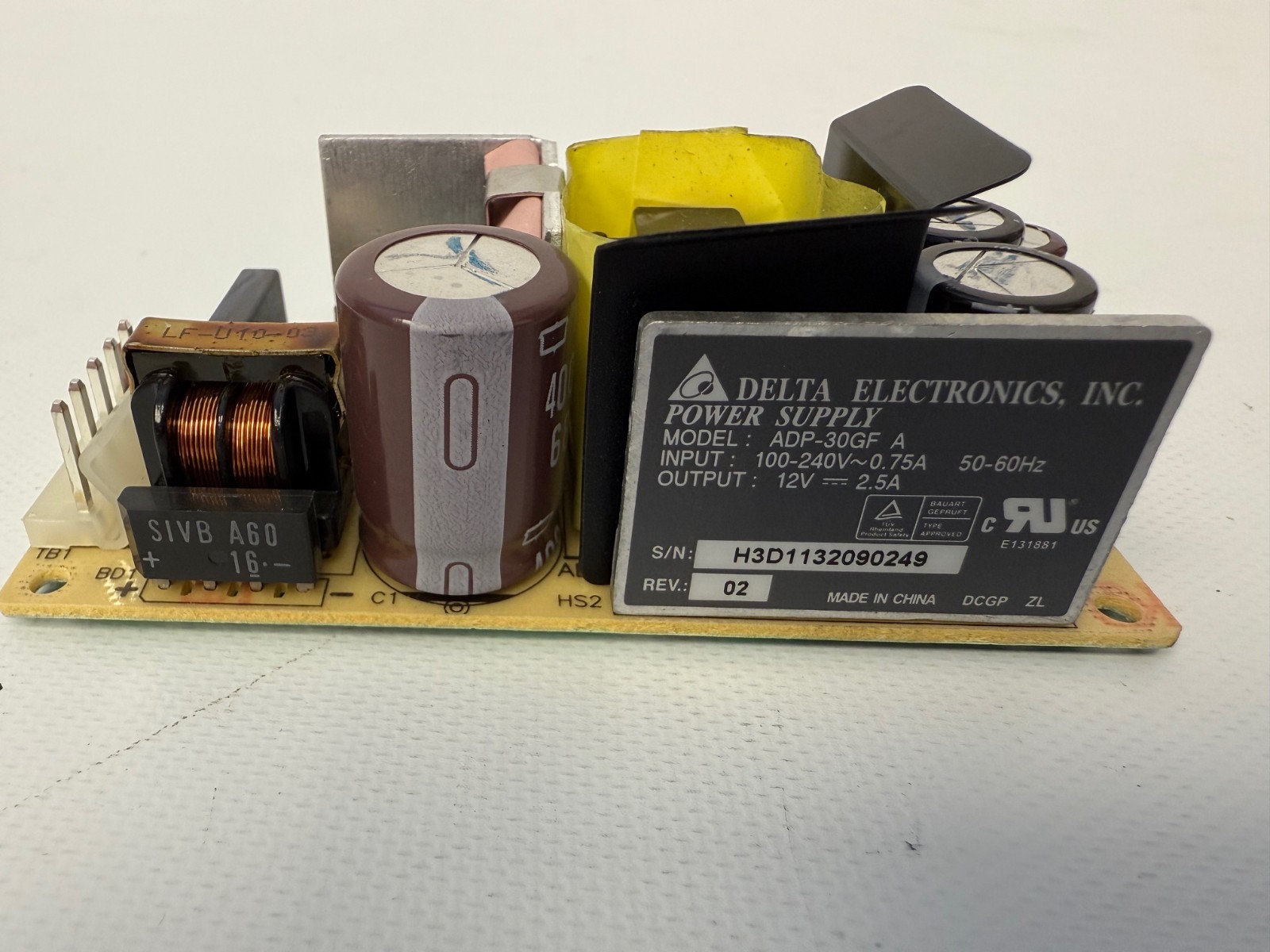 DELTA ELECTRONICS ADP-30GF A POWER SUPPLY BOARD 100-240V .75A 12V 2.5A