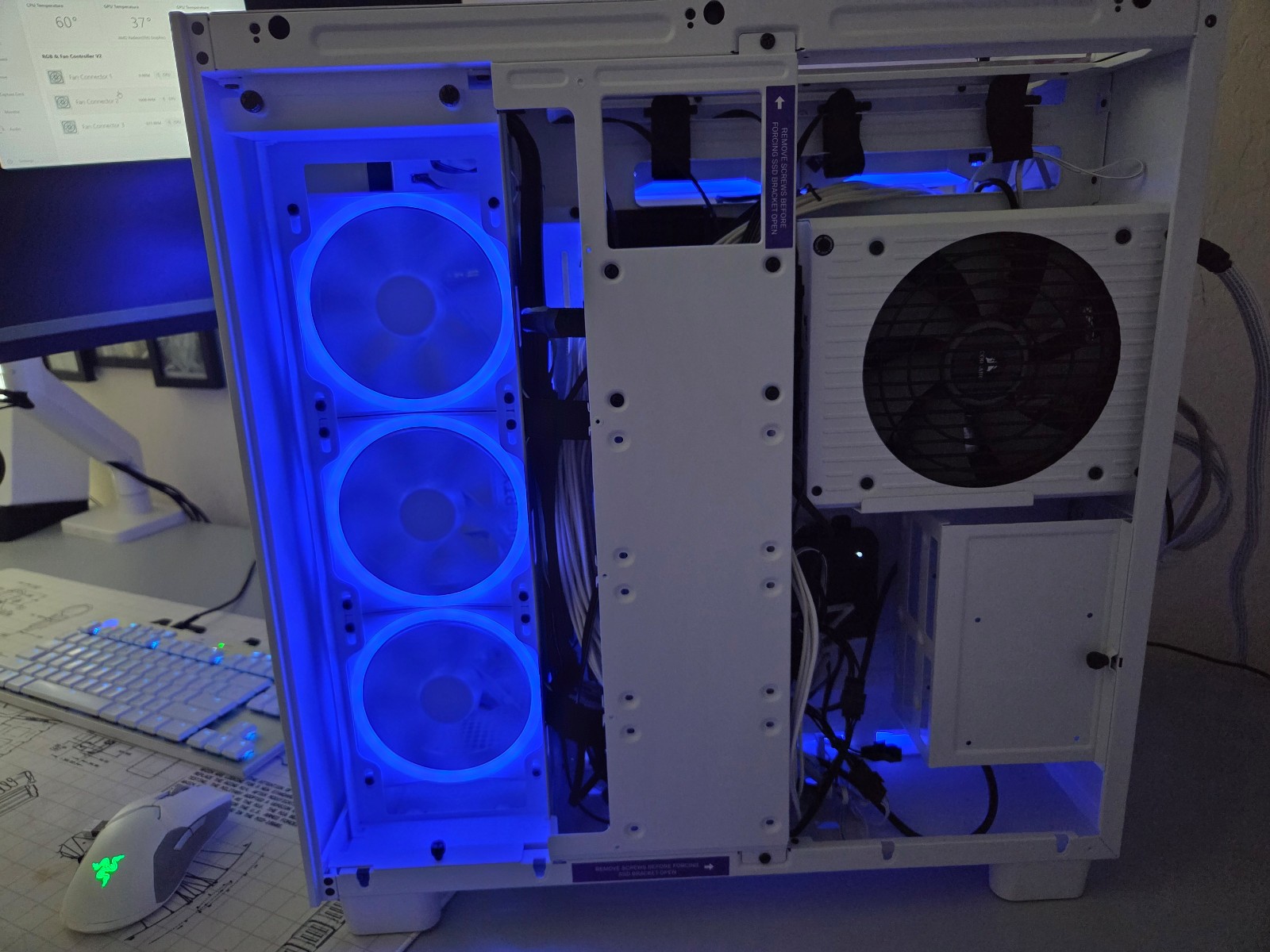 NZXT H9 Elite case, AMD Ryzen 7 9700X, ROG Strix B650E-F MB and a RTX 4070Ti