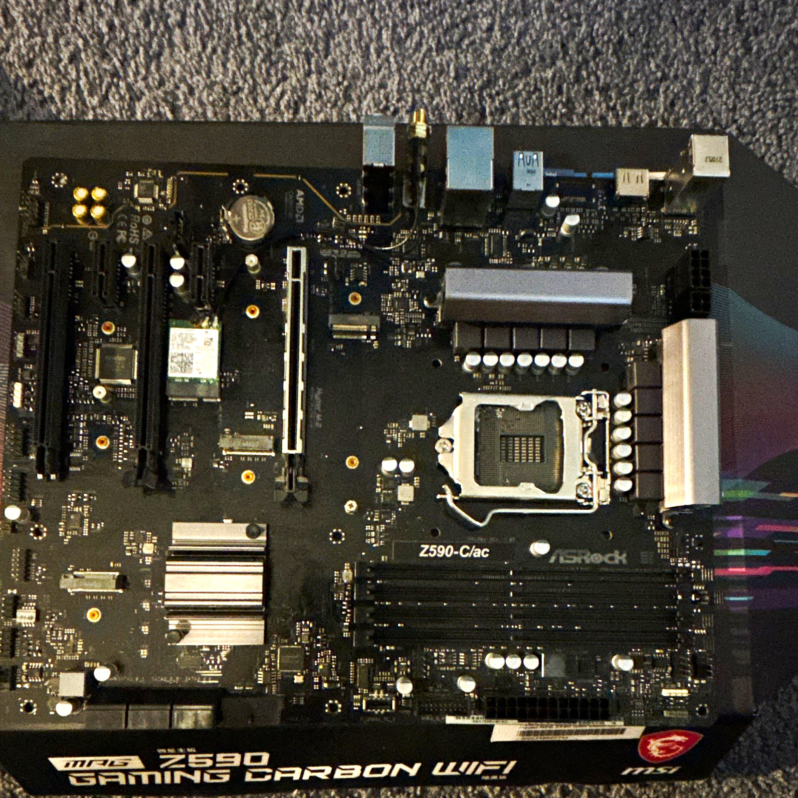ASRock Z590-C/ac ATX Intel LGA1200 DDR4 Gaming Motherboard w/ M.2 (NOT WORKING)