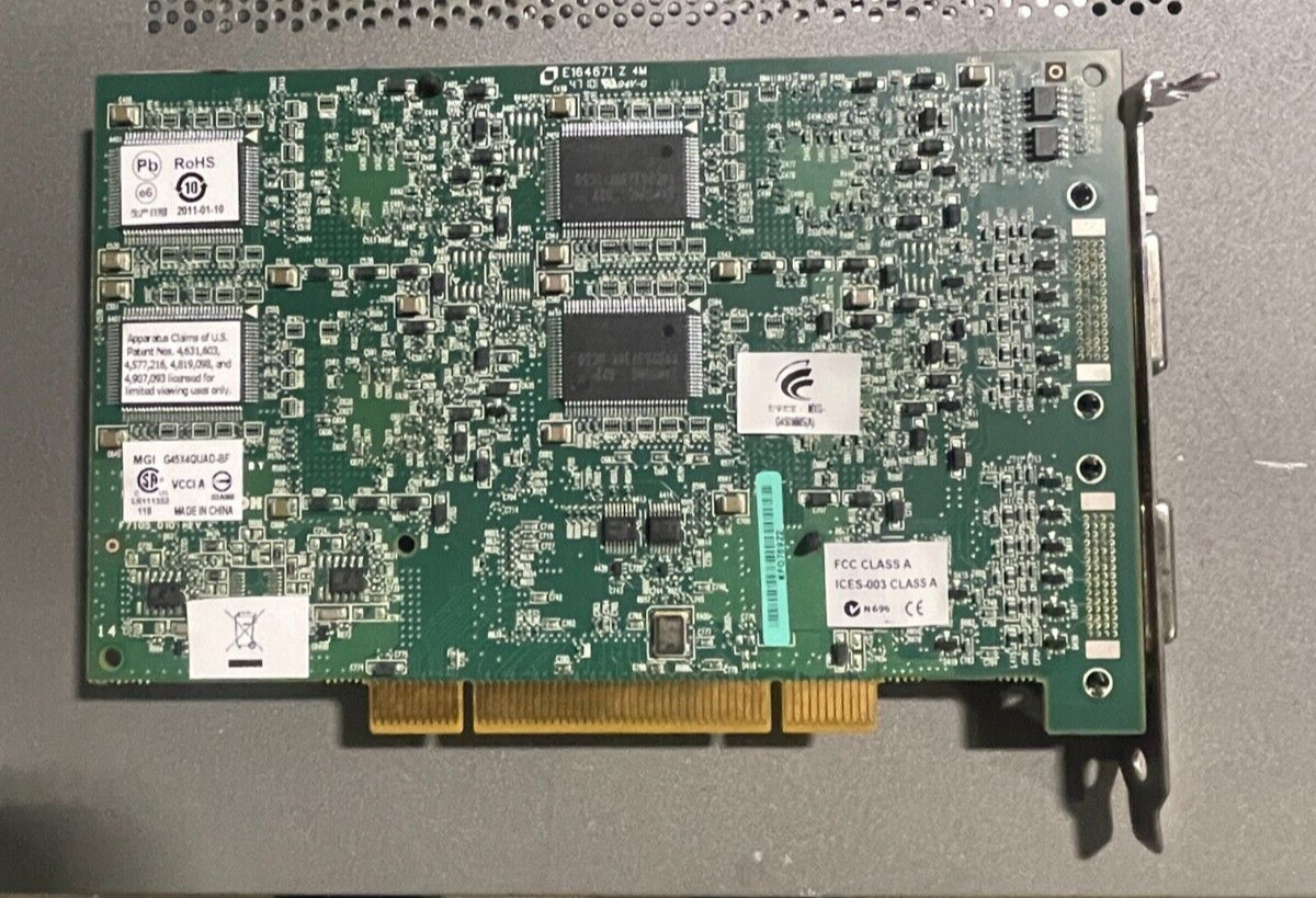 Matrox MGI Model: G45X4QUAD-BF PCI 128MB Multi-Monitor Video Graphics Card