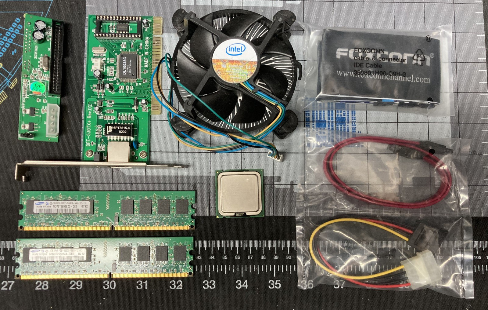Intel Pentium 4 – 2.8Ghz w/ CPU Cooler, PCI Network Card, DDR2 RAM and Extras